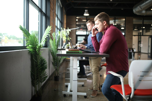 Transform Your Posture with Standing Desks: Office Worker's Guide